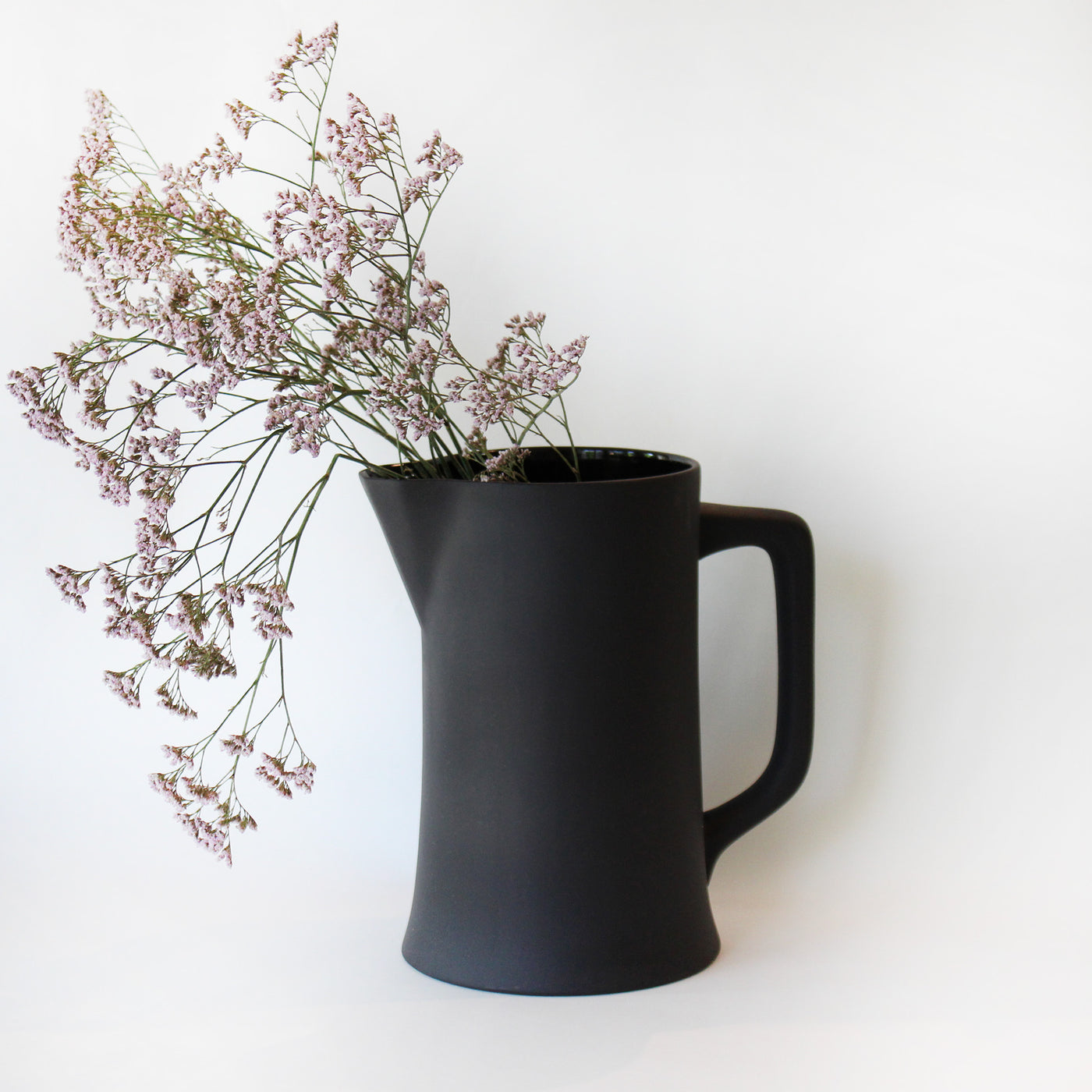 matte black ceramic pitcher or vase
