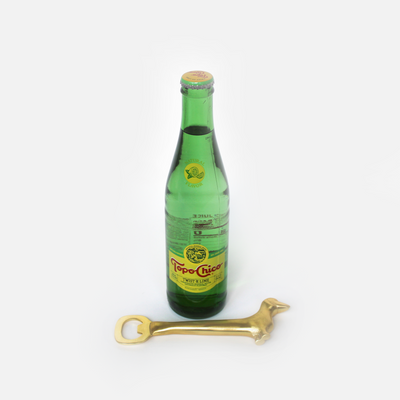 doxie bottle opener in brass